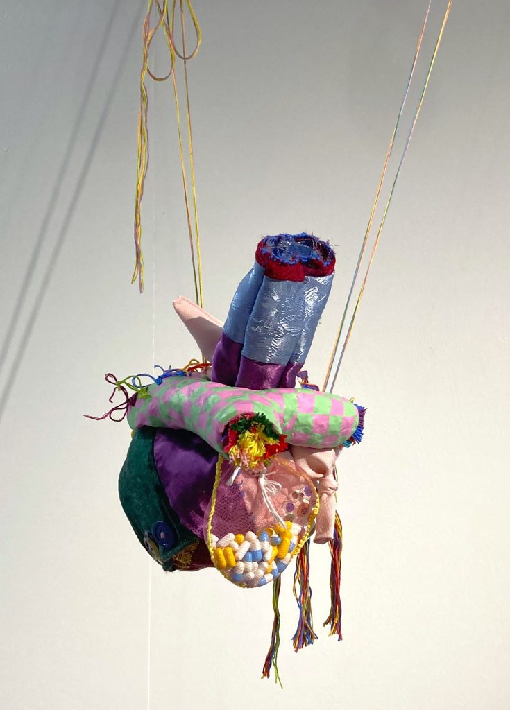 The Artist’s Heart – Madeline Funk-Foster, 2022, Sculpey, found fabrics, embroidery thread, buttons, acrylic paint [image courtesy of artist]