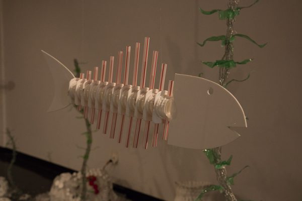 "Deep Sea Changes", 2018, Madeline Hildebrand 
Plastic (HDPE - buckets, PET - bottles, straws, lids of bottles, containers, bags, wrappers, coffee lids, various packaging), chicken wire, fishing line, fishing accessories, and rope