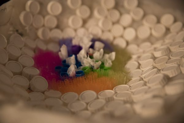 "Deep Sea Changes", 2018, Madeline Hildebrand 
Plastic (HDPE - buckets, PET - bottles, straws, lids of bottles, containers, bags, wrappers, coffee lids, various packaging), chicken wire, fishing line, fishing accessories, and rope
