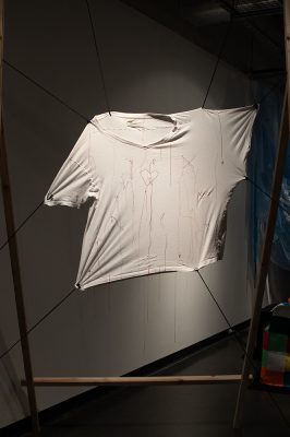 Arya Dewa, Cyrus Siew, Akashdeep Singh,
Blood on the Needle,
2025,
Wood, thread, fabric, sewing needles, scissors,
8’ x 4’ x 6’