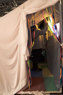 Kiri Davidson, Adrienne Ginther, Kate Hotner, Ella James, Dani Madrid, Avery Pohl, Maggie
Priebe, Angelica Spada,
The Plight at the End of the Tunnel,
2025,
Fabrics, PVC pipe, cardboard, desk, chair, children’s toys,
4.6’ x 4.6’; 6’ x 5’; 7.9’ x 5’